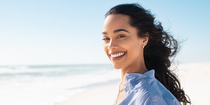 Woman who has glowing healthy skin because of estrogen levels increase.