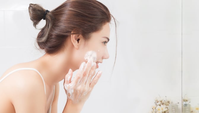 Woman doing her skin care routine