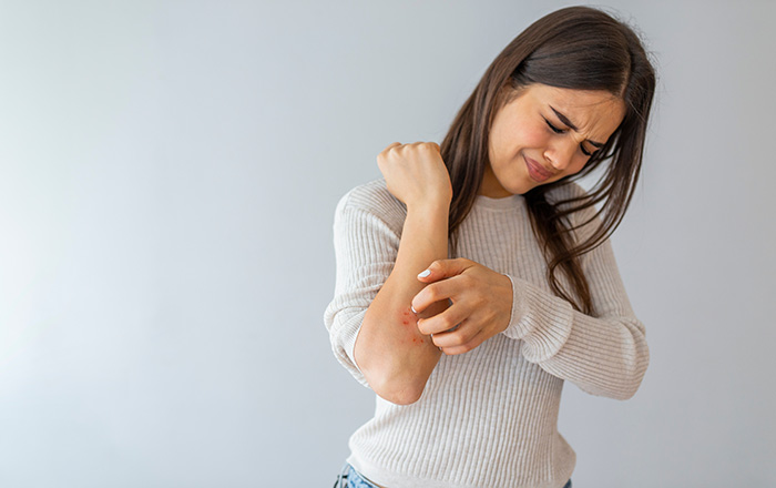 Woman with Itchy Skin