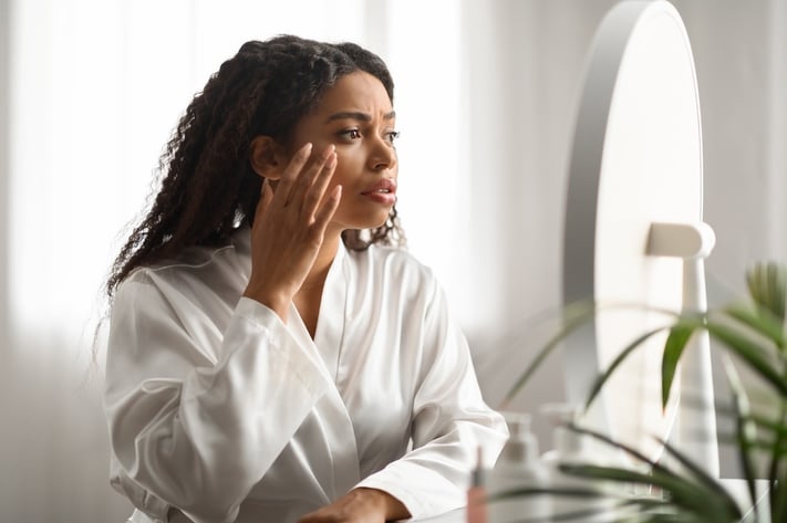 woman seeing signs of aging