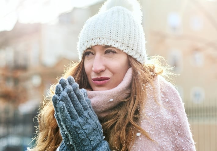 Woman protecting against cold weather