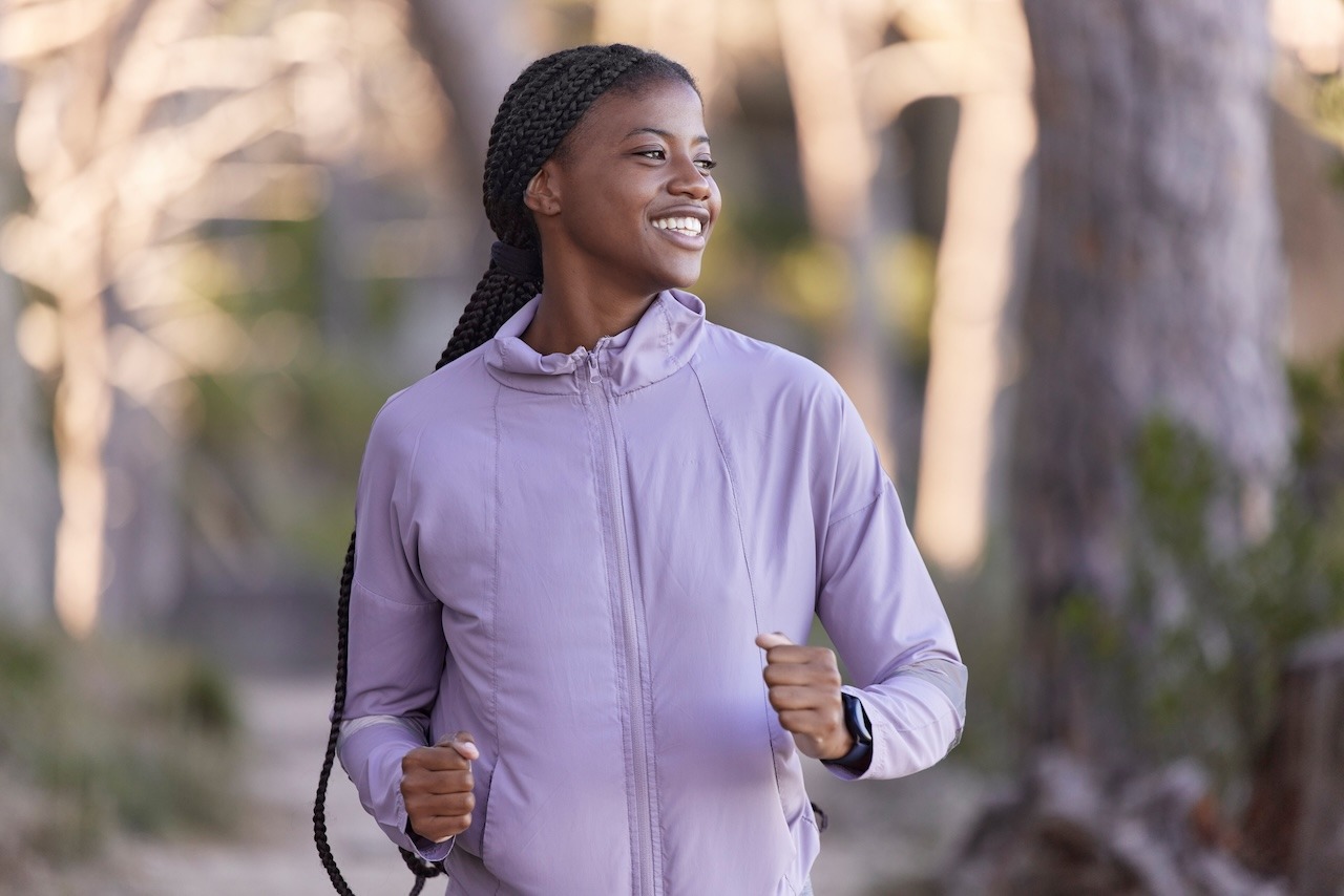 woman exercising to manage pcos skincare symptoms