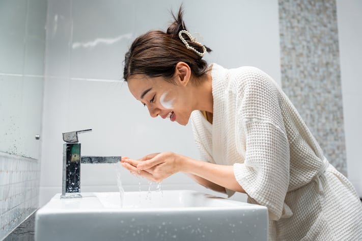woman during skincare routine for athlete