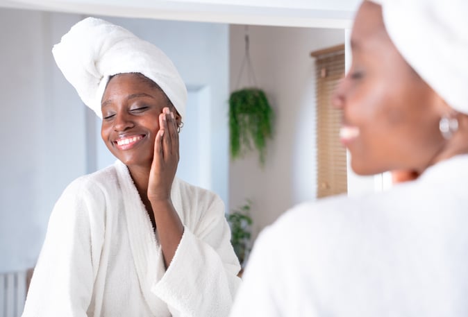 Young woman using a professional skincare routine