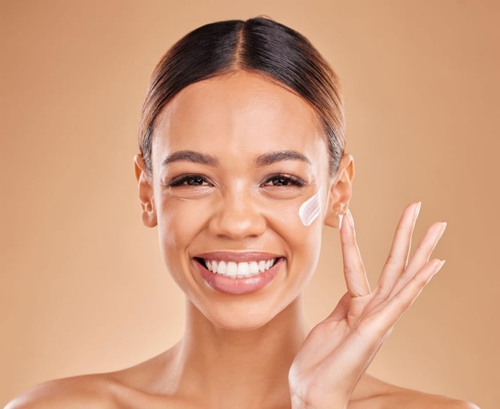 woman using skincare products for sensitive skin