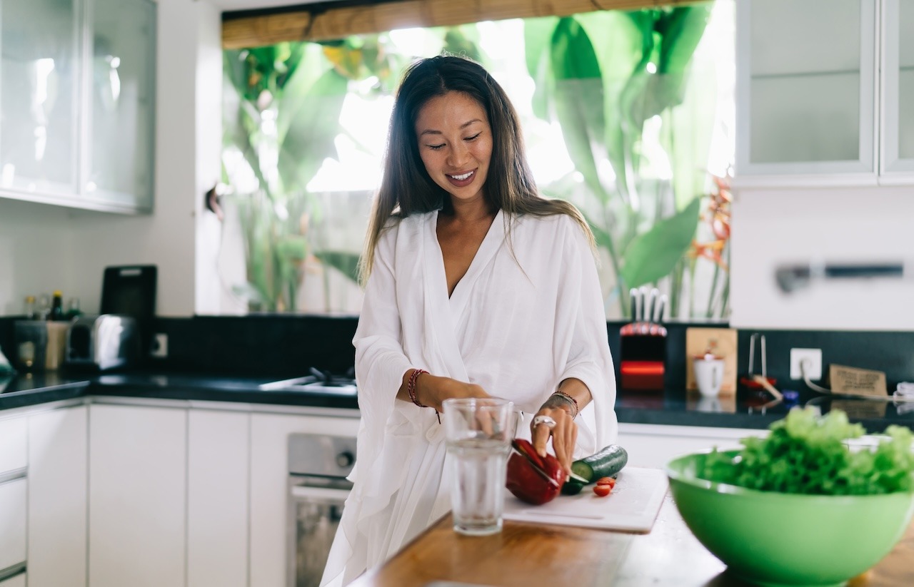 woman eating healthy food to protect skin from within