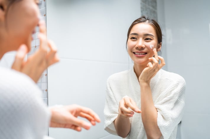 woman taking care of skin during fall